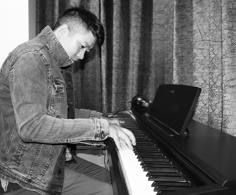 A person playing a piano