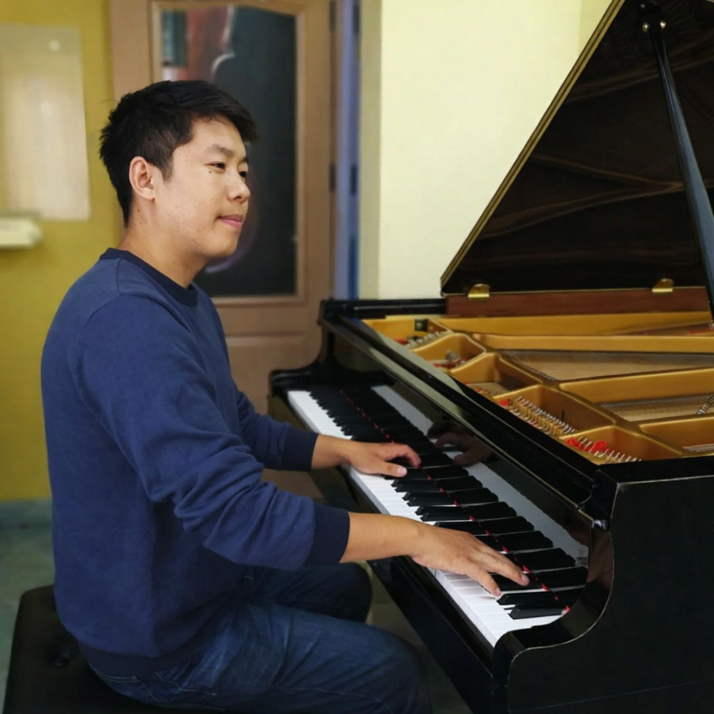 A person playing a piano